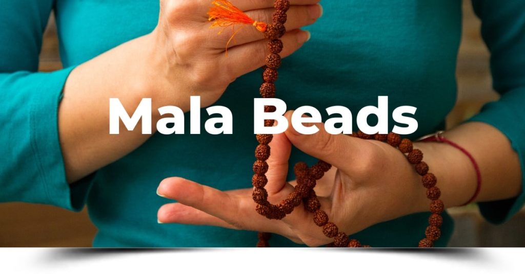 https://www.instantkarmaasheville.com/wp-content/uploads/2014/08/mala-beads-instant-karma-asheville-1024x536-1.jpg